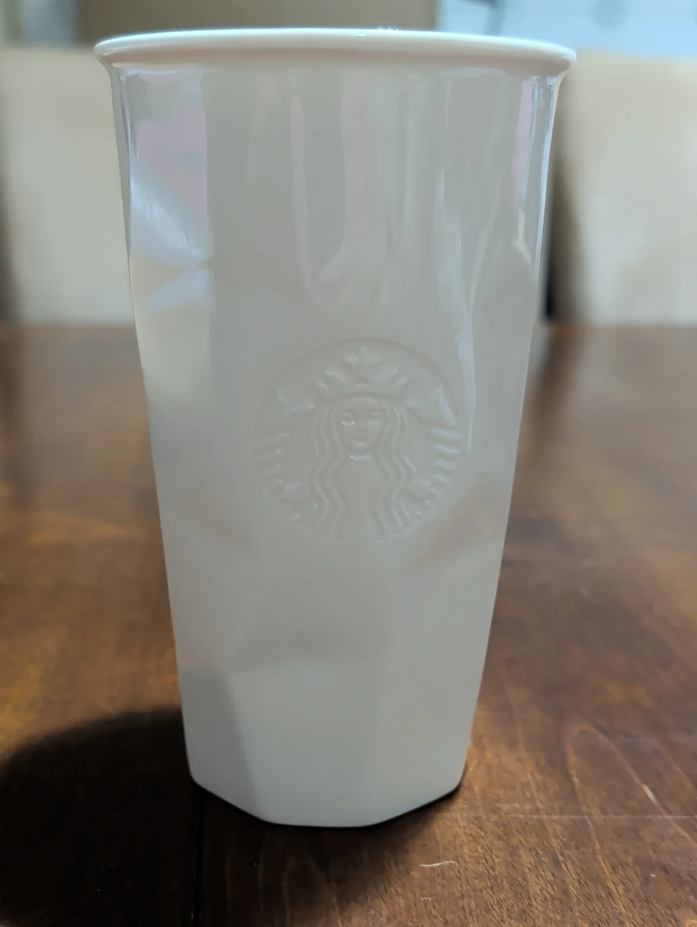 Starbucks 2013 White Faceted Ceramic 10 Ounce Travel Mug.
